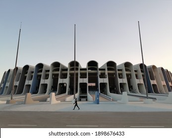 Abu Dhabi, UAE - Circa 2021. Sheikh Zayed Stadium With A Person Walk In Front