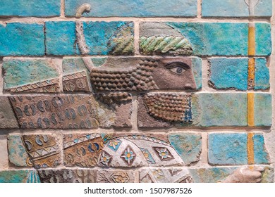 ABU DHABI, UAE - JAN 22, 2019: Ancient Greek sculpture of an warrior on a brick wall at Louvre, Abu Dhabi.