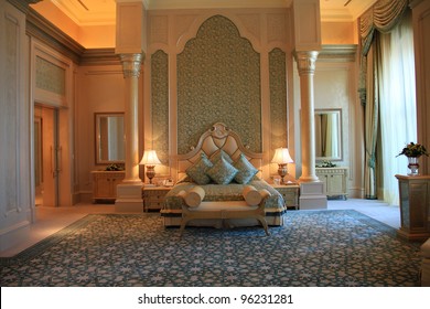 ABU DHABI, UAE - MAY 26: Palace suite bedroom interior of Emirates Palace hotel on May 26, 2011. Emirates Palace is a luxurious 7 star hotel designed by renowned architect, John Elliott RIBA.