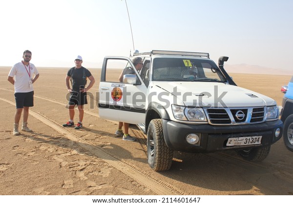 Abu Dhabi, UAE - October 29, 2016: 4x4 (4WD)
support crew for the first international Tropic of Cancer Marathon
held on the Tropic of Cancer latitude line (23d 26' 22