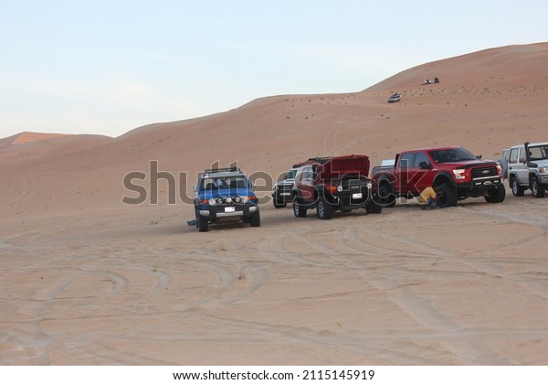 Abu Dhabi, UAE - October 29, 2016: 4x4 (4WD)
support crew for the first international Tropic of Cancer Marathon
held on the Tropic of Cancer latitude line (23d 26' 22