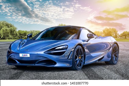 Abu Dhabia / UAE - January 29, 2019: Blue McLaren 720S car in Al jurf Abu Dhabi farm 