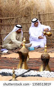 Abu Dhabi/UAE - January 12 2019: Arabic Men Gather Together And Drink Coffee Seating In Traditional Bedouin Tent. Arabic Hospitality Concept