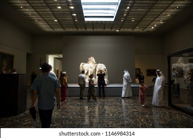 Abu Dhabi/United Arab Emirates - July 28 2018 : exhibition room in Louvre Museum Abu Dhabi with visitors