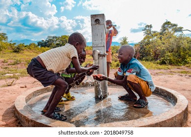 Abuja Nigeria - August 02, 2021: African Children Having Fun as they Express Happiness and Laughter while Playing with Clean Water under the Sun in a Rural Community.
Joyful and Grateful Children