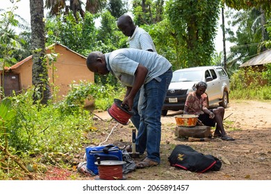 Abuja, Nigeria - October 28, 2021: African Geologist And Team Members Conducting Geophysical Survey For Water Availability In The Ground. Soil Science And Test. Rural Water Project.