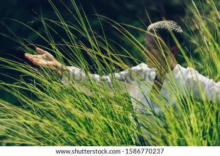 Abundance in Springtime, Woman with Open Arms, Connected with Nature, Enjoying Life