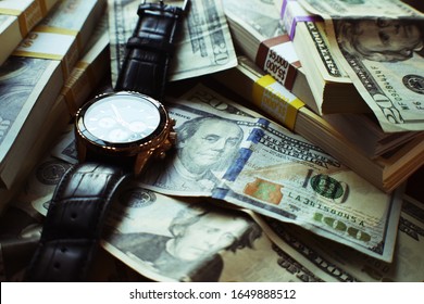 Abundance Of Wealth With Luxury Watch & Stacks Of Money  - Shutterstock ID 1649888512
