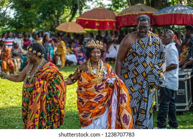 Aburi, Ghana- November 10 2018: Kings and Qeens wearing rich Kente cloth walking in state at Odwira Festval in Ghana.