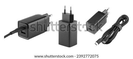 AC charger with USB and Type-C connector on isolated and white background, close-up