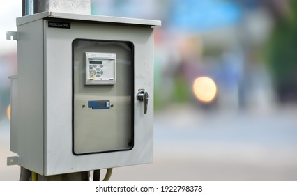 Ac And Dc Cabinet Power Controller Hanging On The Pole Beside The Road. It Used For Controlling Photovoltaic Power System.