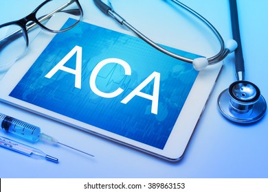 ACA word on tablet screen with medical equipment on background