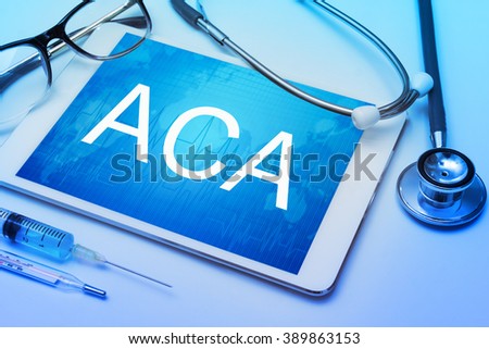 ACA word on tablet screen with medical equipment on background Imagine de stoc © 