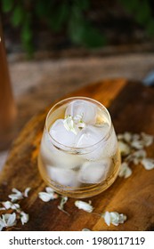 Acacia Flowers Syrup In A Glass With Cold Iced Water