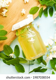 Acacia Syrup Homemade Honey With Flowers On Wood. Shallow Dof.