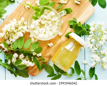 Acacia Syrup Homemade Honey With Flowers On Wood. Shallow Dof.