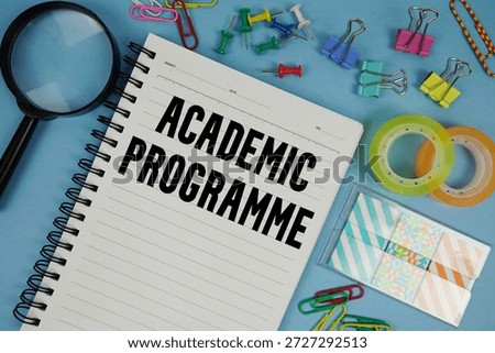 Academic Programme text with magnifying glass on blue background