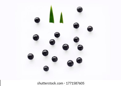 Acai Berry Fruit From The Amazon. On Isolated White Background. Top View