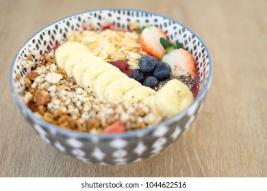 Acai Bowl (Side View) - Acai Berry, Banana, Mixed Berries Blended With Cold Pressed Apple Juice Topped With In House Made Granola And Chia Seeds