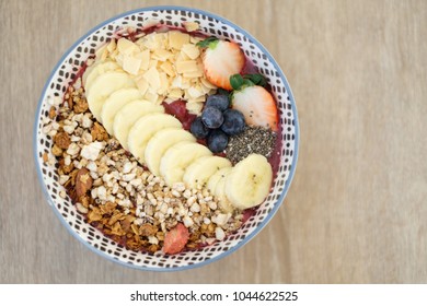 Acai Bowl (Top View) - Acai Berry, Banana, Mixed Berries Blended With Cold Pressed Apple Juice Topped With In House Made Granola And Chia Seeds