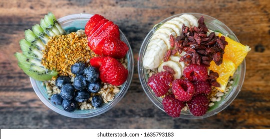 Acai Bowls Top View Banner Panoramic Of Healthy Food Breakfast Smoothie Bowl At Restaurant. Two Fruit Cups Filled With Spirulina, Kiwi, Goji Berries Summer Eating.