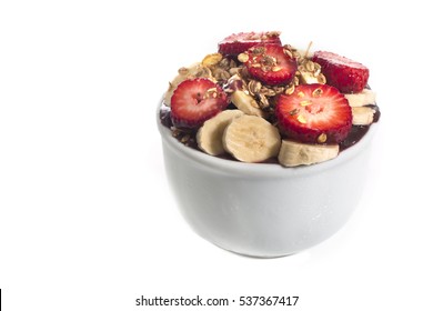 Acai Cream With Banana And Strawberry In Bowl Isolated Over White Background. Brazilian Famous Fruit From Amazon.