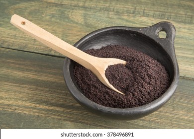 Acai Powder In Wooden Spoon