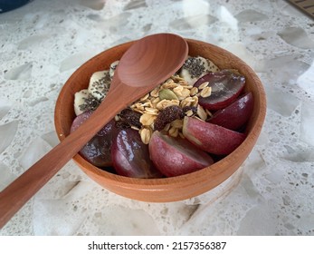 Acai Smoothie Bowl With Berry Yoghurt, Grape, Banana, And Almont Crumbs On Wooden Bowl