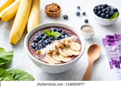 Acai Smoothie Bowl Topped With Banana, Chia Seed, Blueberries, Walnuts And Coconut. Concept Of Healthy Eating, Healthy Lifestyle, Dieting, Detox And Vegan Food