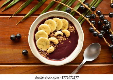 Acai Smoothie Bowls With Banana, Cashew And Linseed On Wooden Background. Close-up, Top View