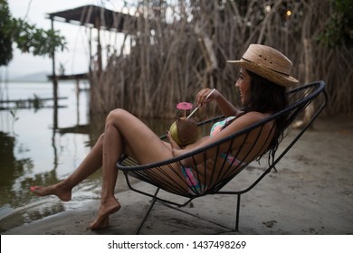 Acapulco, Guerrero / Mexico - June 15 2016: Beautiful Mexican woman enjoying an afternoon in the Lake.