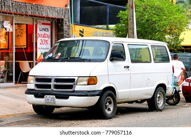 Acapulco, Mexico - May 30, 2017: White Minibus Dodge Ram Van In The City Street.