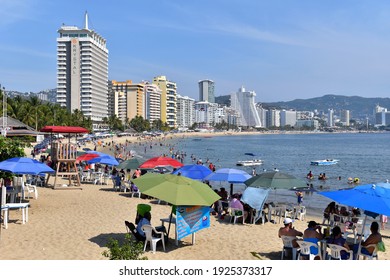 Acapulco, Mexico-December 12 2020: A picture of Papagayo beach, it can see tourists and hotels. Acapulco