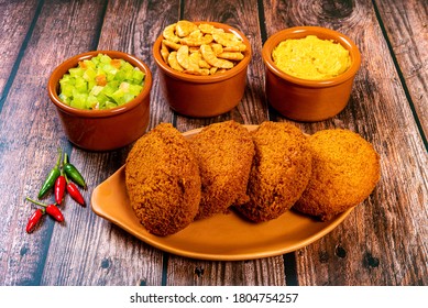 Acaraje - Traditional Brazilian Dumpling Made With Black-eyed Peas And Onion Stuffed With Vatapa, Caruru, Tomato Salad And Shrimp. Typical Foods From Bahia.