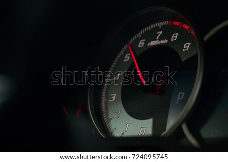 Accelerating car. Throttle goes up in the tachometer.