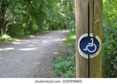 Acceptability for people in a wheelchair that can acces this road in the woods.