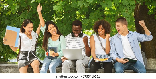 Accepted Students. Joyful Multicultural Teens Celebrating Success With Laptop Outdoors, Cheering Successful Exam Pass, Panorama