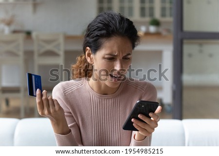 Access denied. Angry hispanic woman unable to make payment via smartphone scold mobile banking service for error mistake. Annoyed young lady ebank client enter wrong password from personal credit card