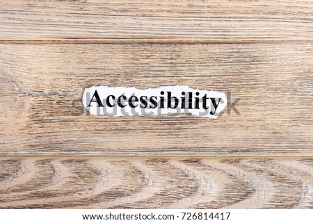 Accessibilit text on paper. Word Accessibilit on torn paper. Concept Image. Foto d'archivio © 