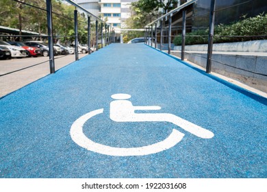 Accessibility Ramp For Wheelchair Users With Accessibility Symbol Design.