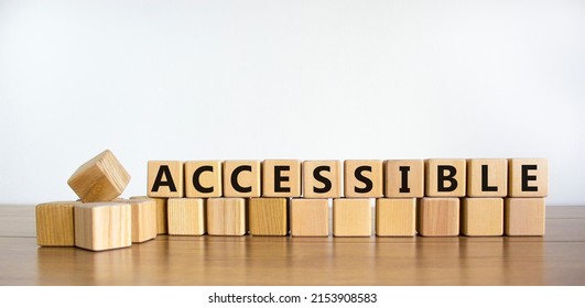 Accessible symbol. The word accessible on wooden cubes. Beautiful wooden table, white background. Business and accessible concept. Copy space. - Shutterstock ID 2153908583