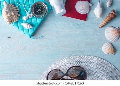 Accessories For A Bright Summer Sunny Holiday In The Resort. Items For Travel To The Sea Laid Out On A Wooden Table. Top View