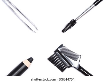 Accessories For Care Of The Brows: Eyebrow Pencil, Tweezers, Brush And Comb On White Background. Eyebrow Grooming Tools