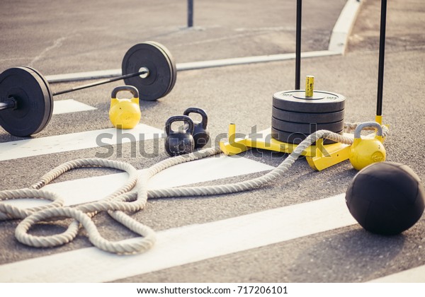 accessories for fitness. Dumbbells, weight plates,\
gloves rope sled