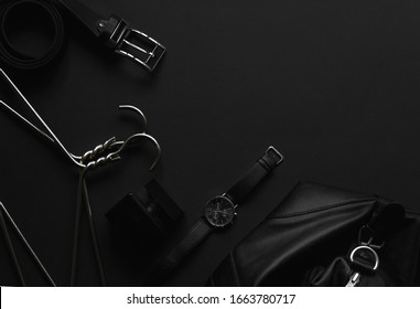 Accessories For Men's Beauty On A Monochromatic Background.
Watch, Perfume, Belt, Hanger, Wallet Leather. Minimal Black Trend 2020. Top View With Copy Space Flatlay.