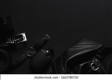 Accessories For Men's Beauty On A Monochromatic Background.
Watch, Perfume, Belt, Hanger, Wallet Leather. Minimal Black Trend 2020. Top View With Copy Space Flatlay.