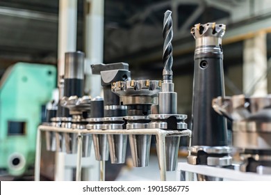 Accessories And Tools For A CNC Machine On A Rack For Equipment At A Factory And Enterprise.