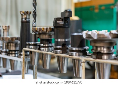 Accessories And Tools For A CNC Machine On A Rack For Equipment At A Factory And Enterprise.