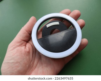 Accessory for smartphone and computer in the  hand