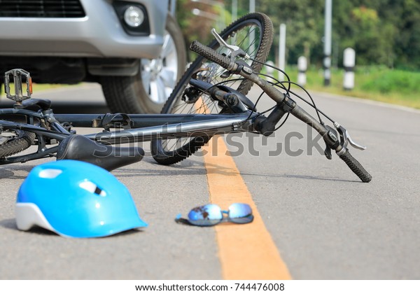Accident car crash with\
bicycle on road